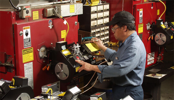 Technician Servicing Heater Technician Servicing Heater